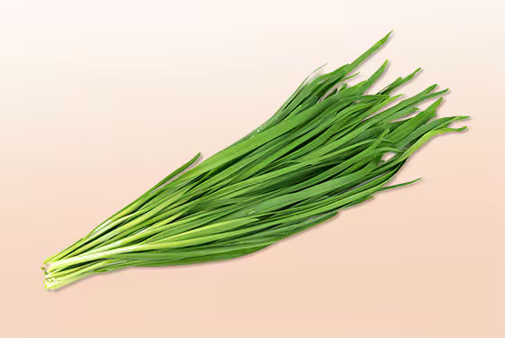 Fresh green Garlic Chives (Pickup Only) bundle with long slender leaves displayed against a soft background